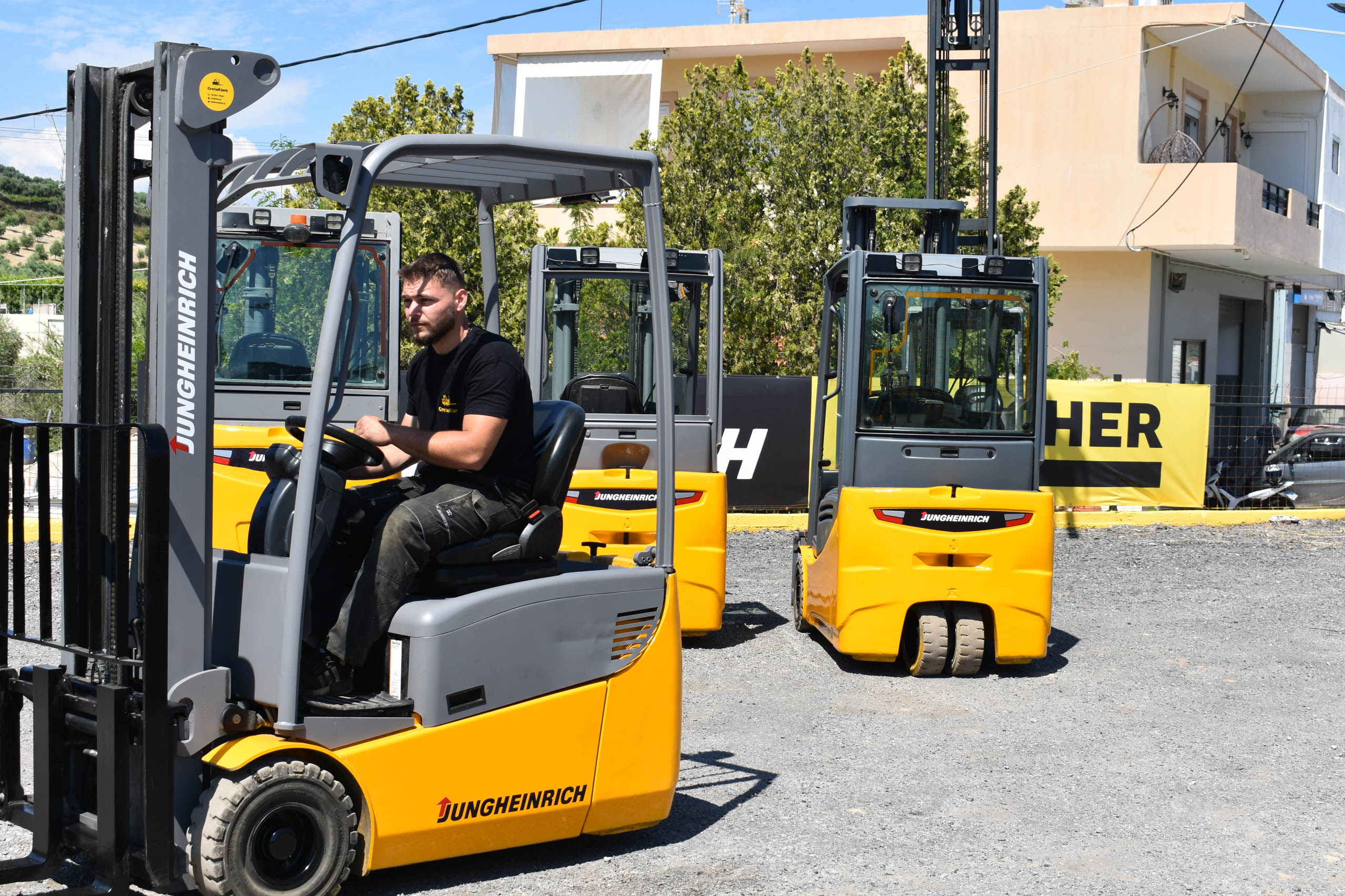 Technicians working on forklift